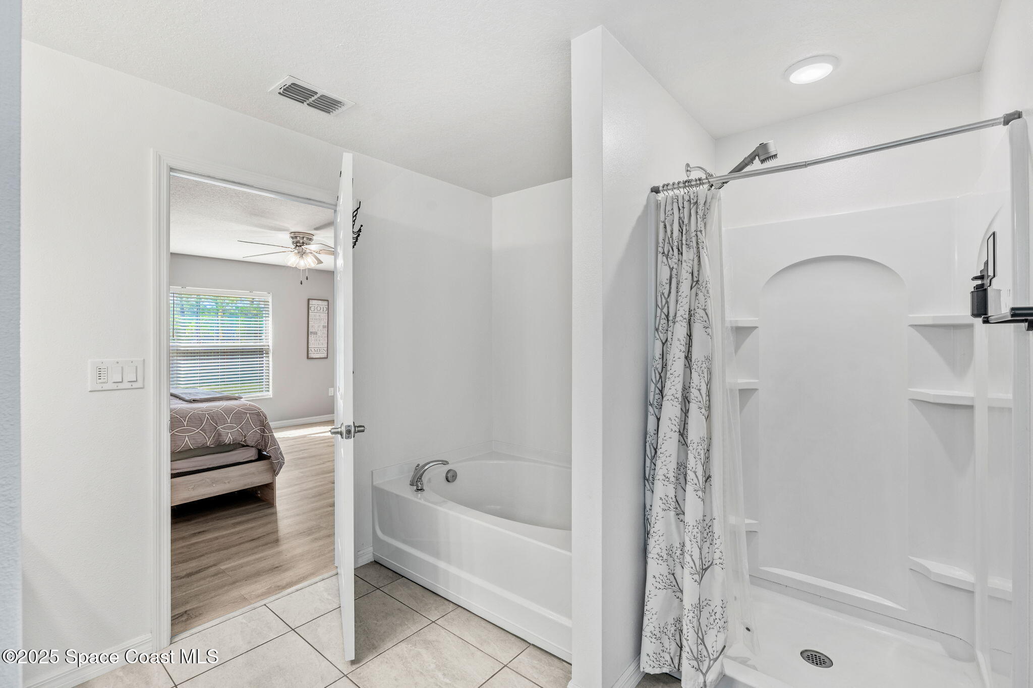 610 Wildmer Road Southwest Palm Bay, FL 32908 - Photo 10 of 28 Primary Bathroom