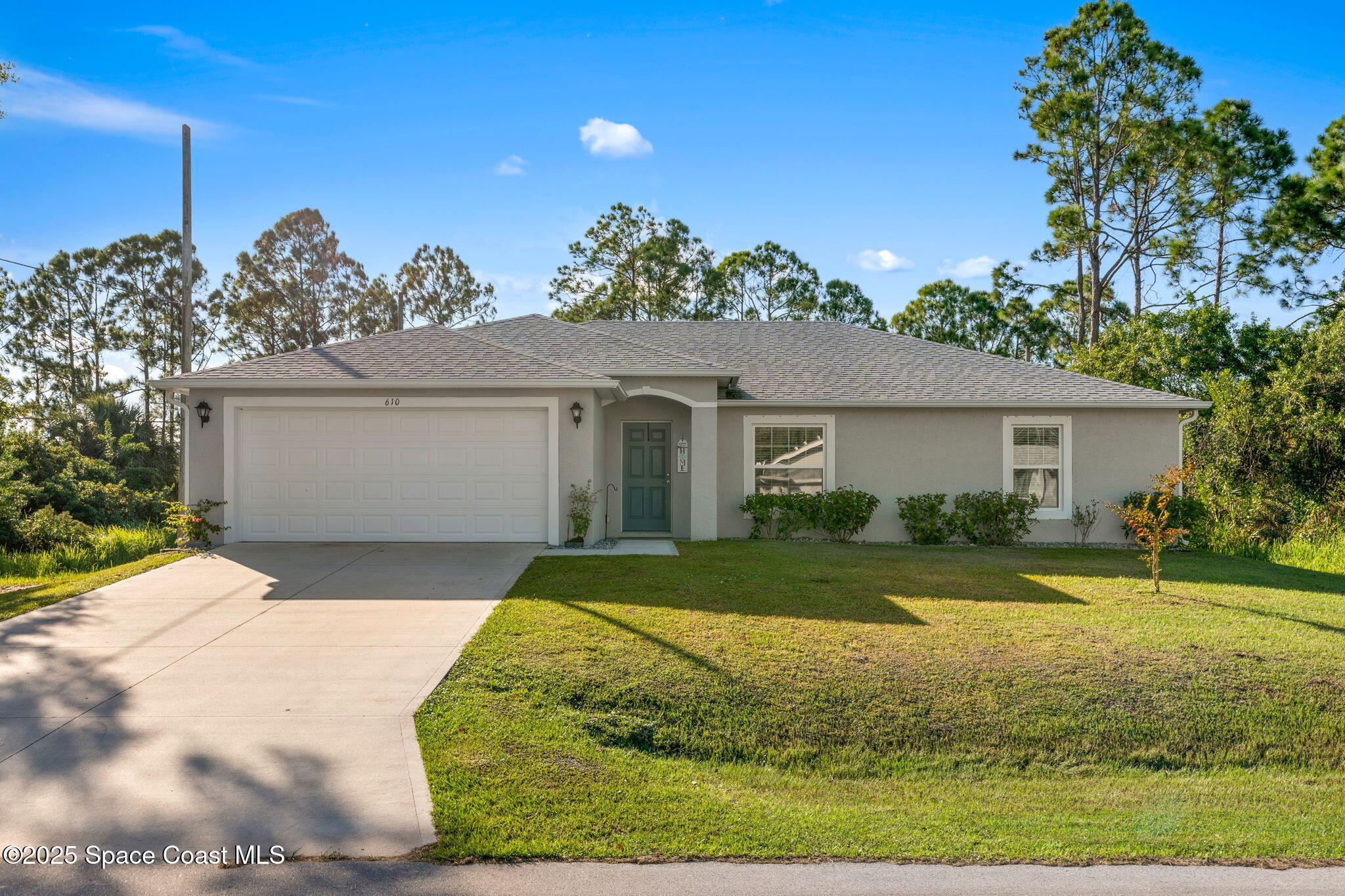 610 Wildmer Road Southwest Palm Bay, FL 32908 - Photo 3 of 28 Front of Home