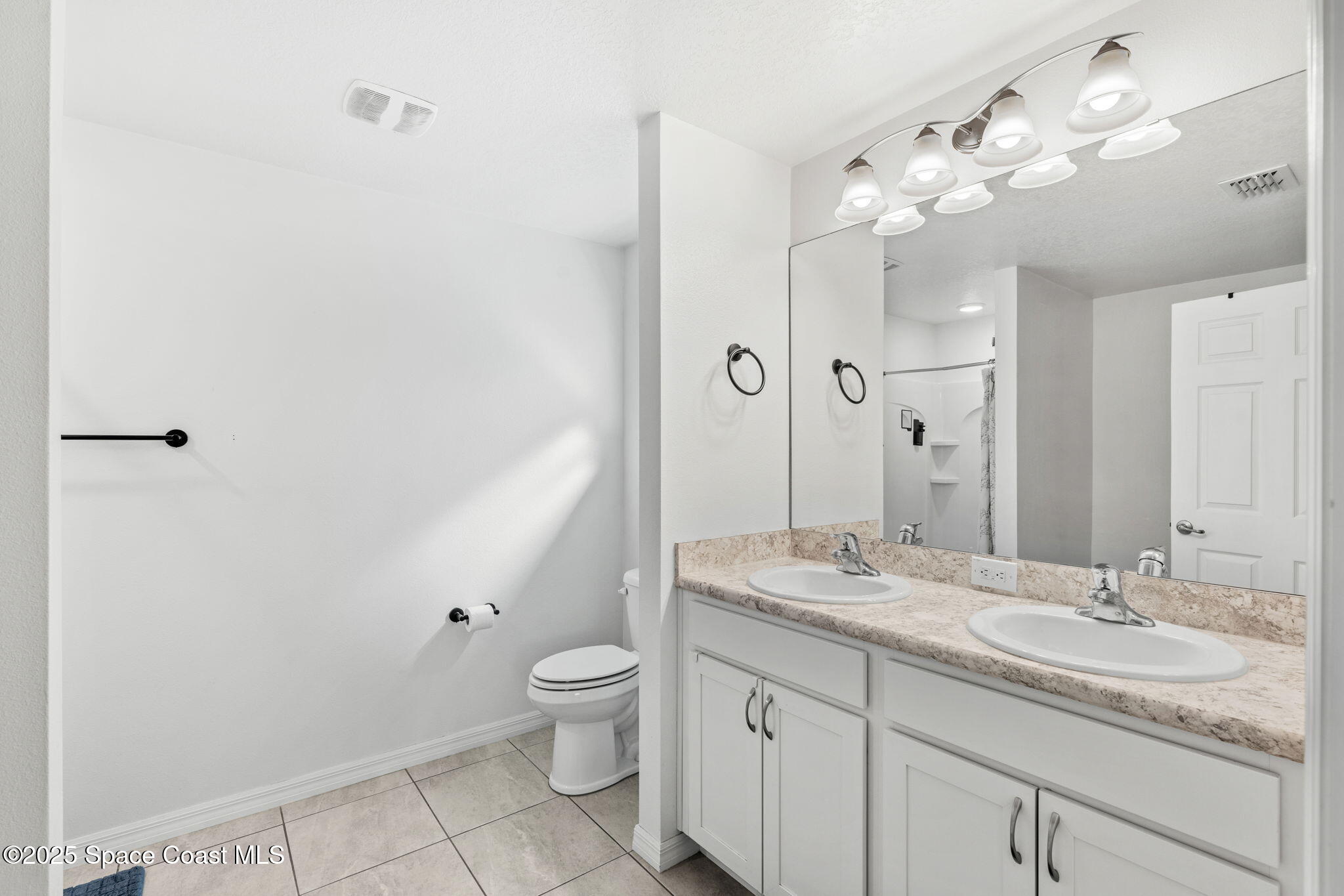 610 Wildmer Road Southwest Palm Bay, FL 32908 - Photo 9 of 28 Primary Bathroom