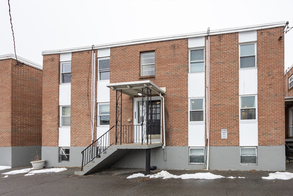 8 Avon Street, Unit 10 Somerville, MA 02143 - Photo 18 of 18 a front view of a building with windows