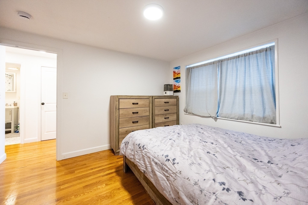 8 Avon Street, Unit 10 Somerville, MA 02143 - Photo 10 of 18 a bedroom with a bed and a window