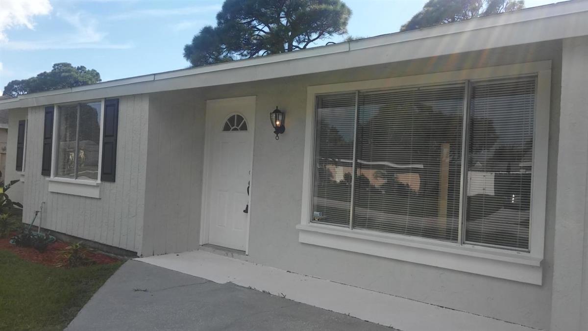 374 Southwest Cherryhill Road Port St. Lucie, FL 34953 - Photo 2 of 34 front elevation