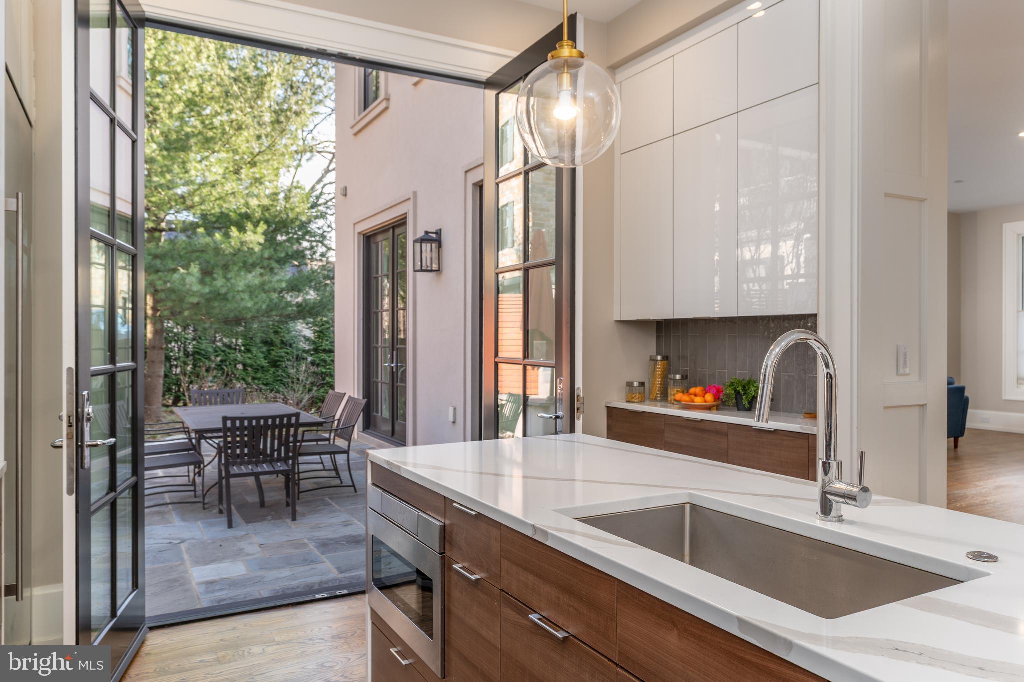 3128 Appleton Street Northwest Washington, DC 20008 - Photo 21 of 80 a kitchen with a sink and a large window
