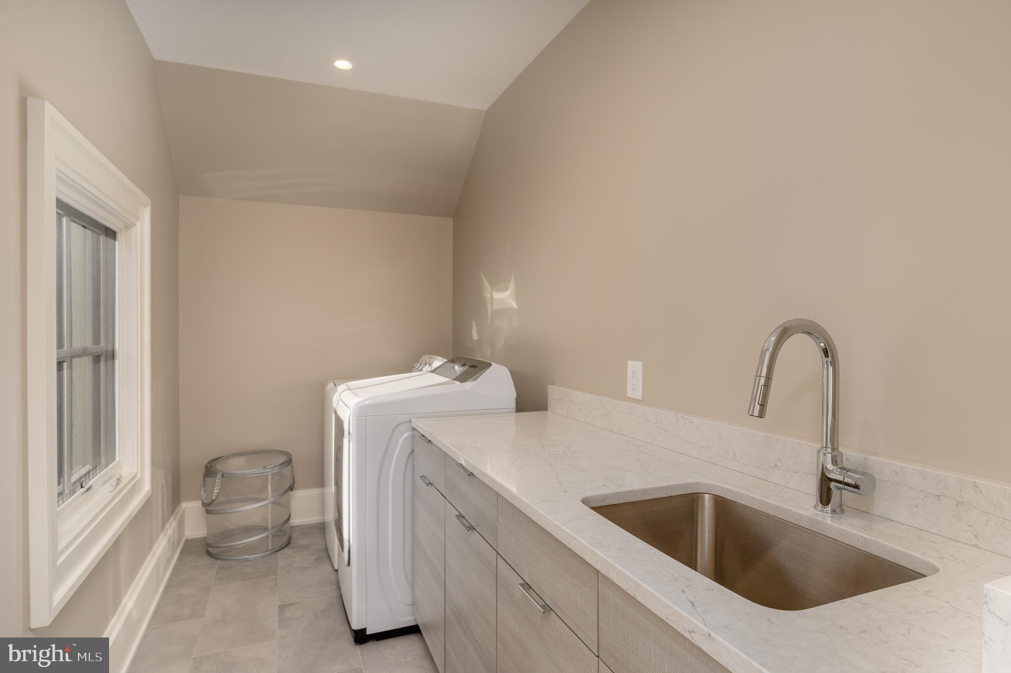 3128 Appleton Street Northwest Washington, DC 20008 - Photo 45 of 80 a bathroom with a sink and a toilet