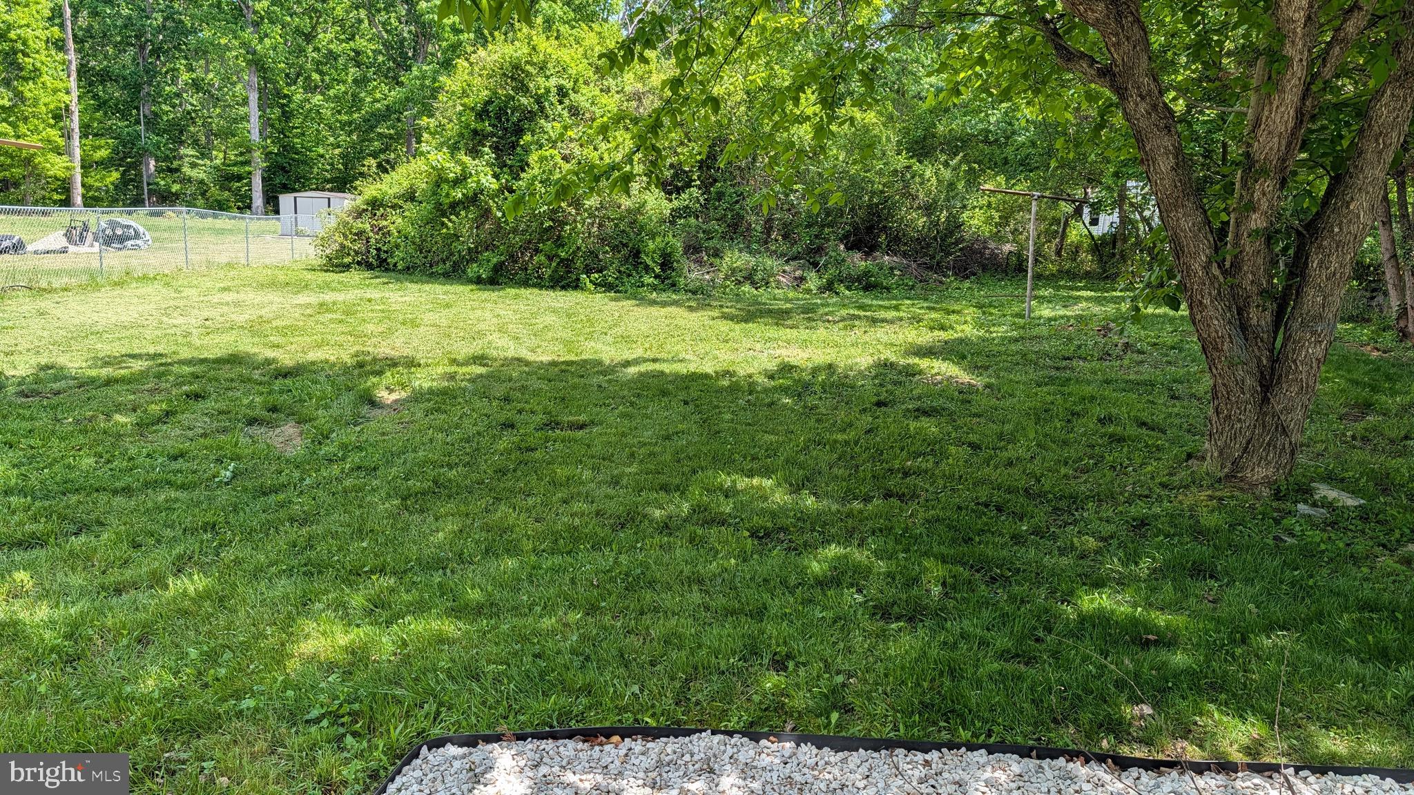 16110 Bealle Hill Road Waldorf, MD 20601 - Photo 18 of 18 a view of outdoor space with trees all around