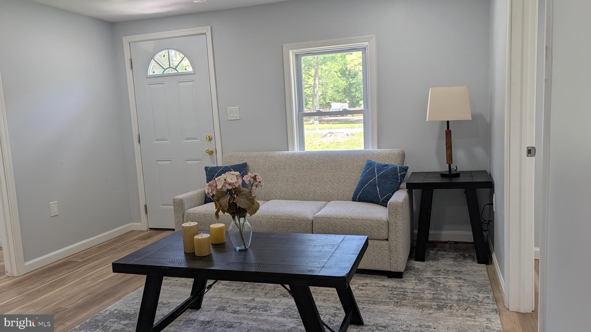 16110 Bealle Hill Road Waldorf, MD 20601 - Photo 2 of 18 a living room with furniture and a window