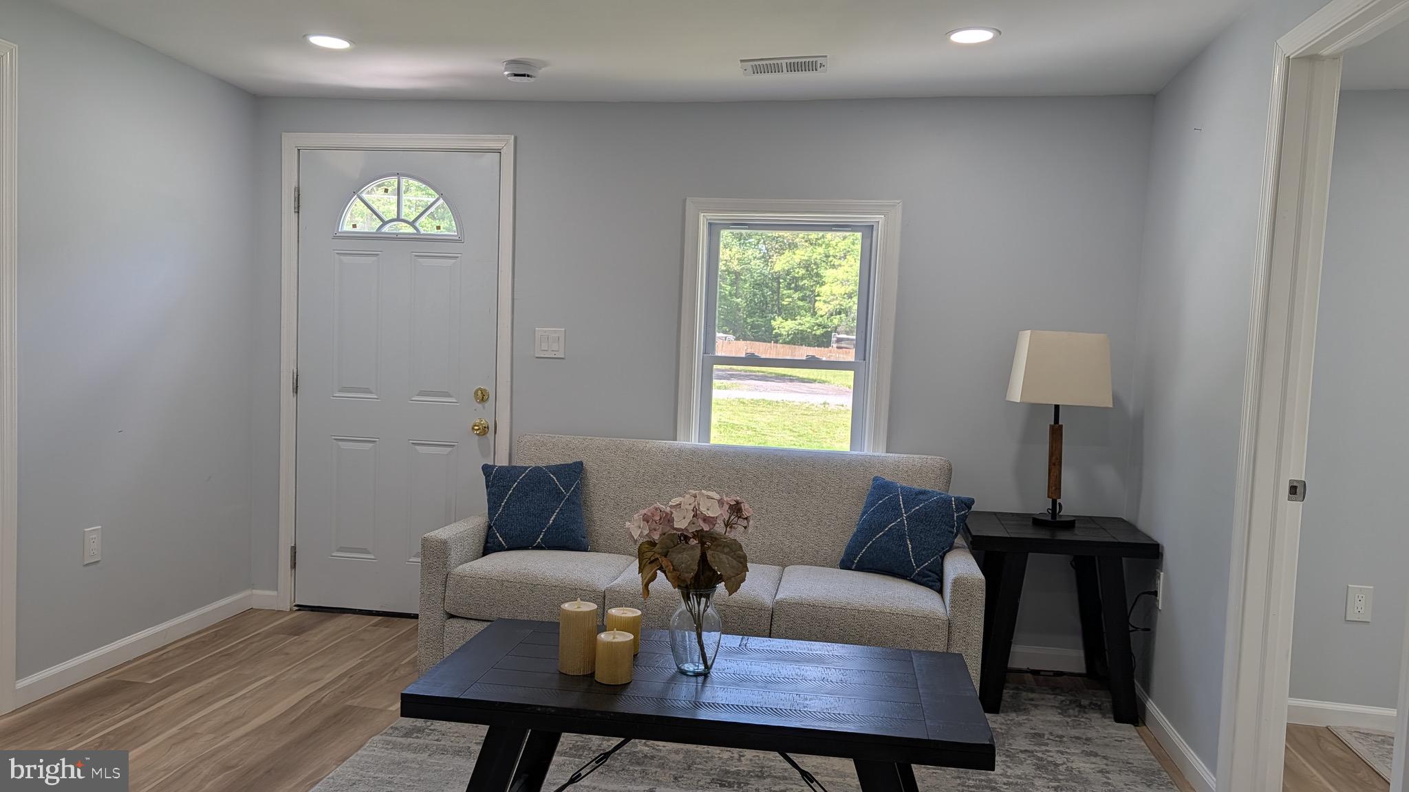 16110 Bealle Hill Road Waldorf, MD 20601 - Photo 4 of 18 a living room with furniture and a window