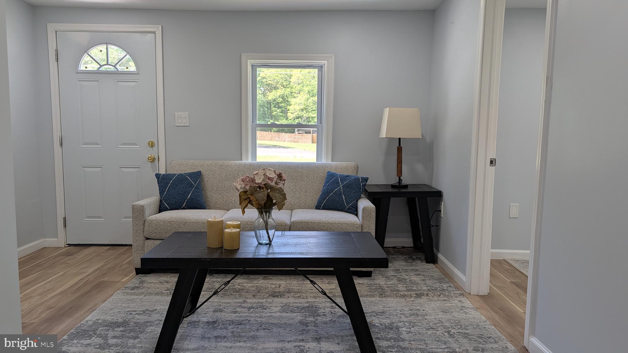 16110 Bealle Hill Road Waldorf, MD 20601 - Photo 5 of 18 a living room with furniture and a window