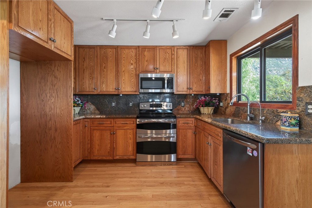 20682 Hill Top Drive Riverside, CA 92507 - Photo 12 of 70 The kitchen has been nicely upgraded.