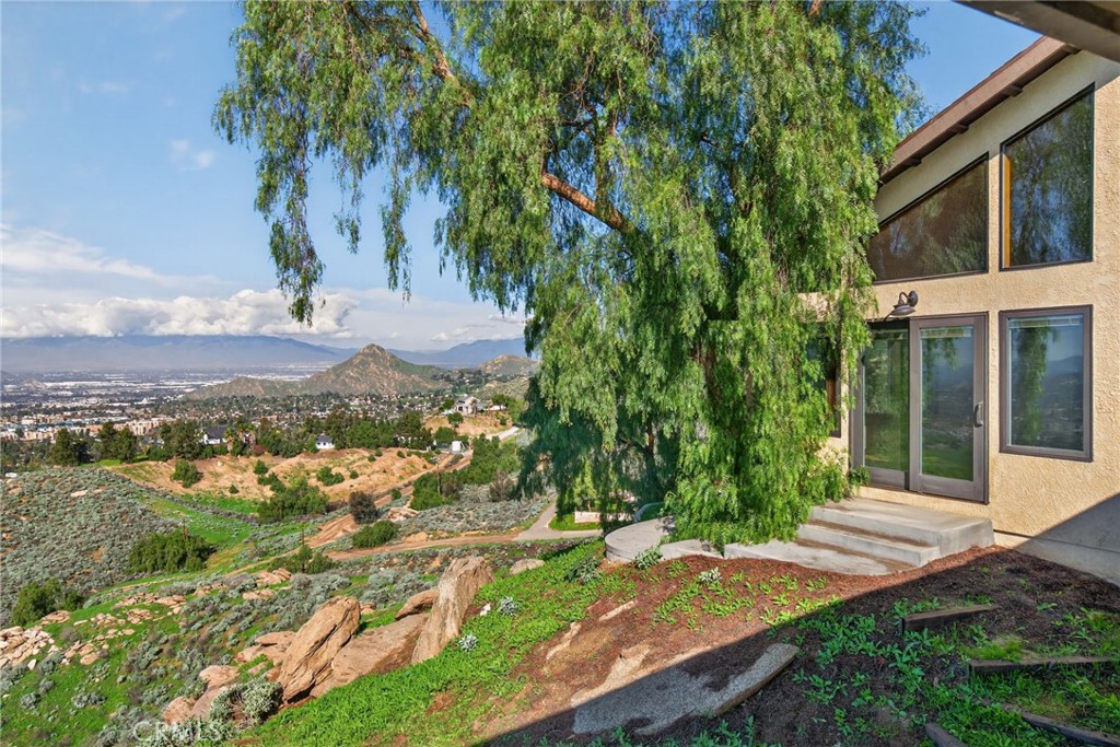 20682 Hill Top Drive Riverside, CA 92507 - Photo 25 of 70 an aerial view of a house with yard and green space