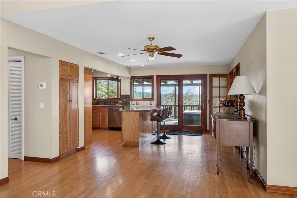 20682 Hill Top Drive Riverside, CA 92507 - Photo 34 of 70 a view of a livingroom with hardwood floor and a workspace