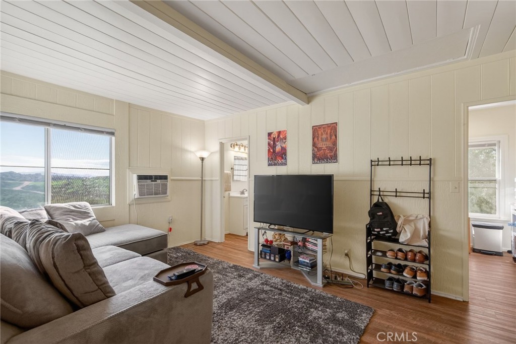 20682 Hill Top Drive Riverside, CA 92507 - Photo 51 of 70 This ADU has great views too! This view of the living room shows the door to the kitchen (right) and the door to the bathroom (left).