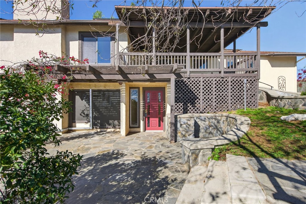 20682 Hill Top Drive Riverside, CA 92507 - Photo 6 of 70 a front view of a house with a porch
