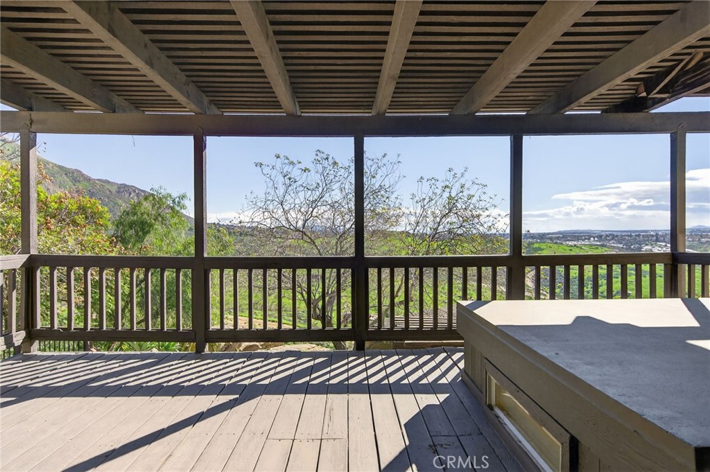 20682 Hill Top Drive Riverside, CA 92507 - Photo 10 of 70 a view of a balcony with wooden floor