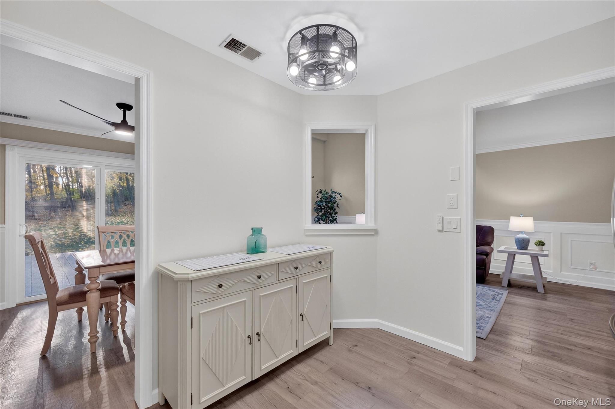 2 Deer Crossing Drive Fishkill, NY 12524 - Photo 22 of 49 a view of a dining room with furniture window and wooden floor