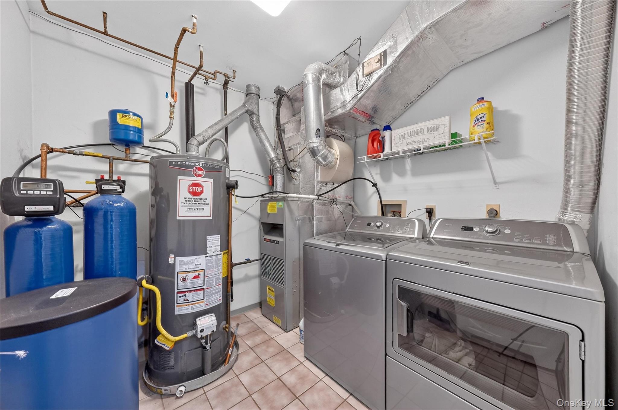 2 Deer Crossing Drive Fishkill, NY 12524 - Photo 24 of 49 a utility room with cabinets dryer and washer