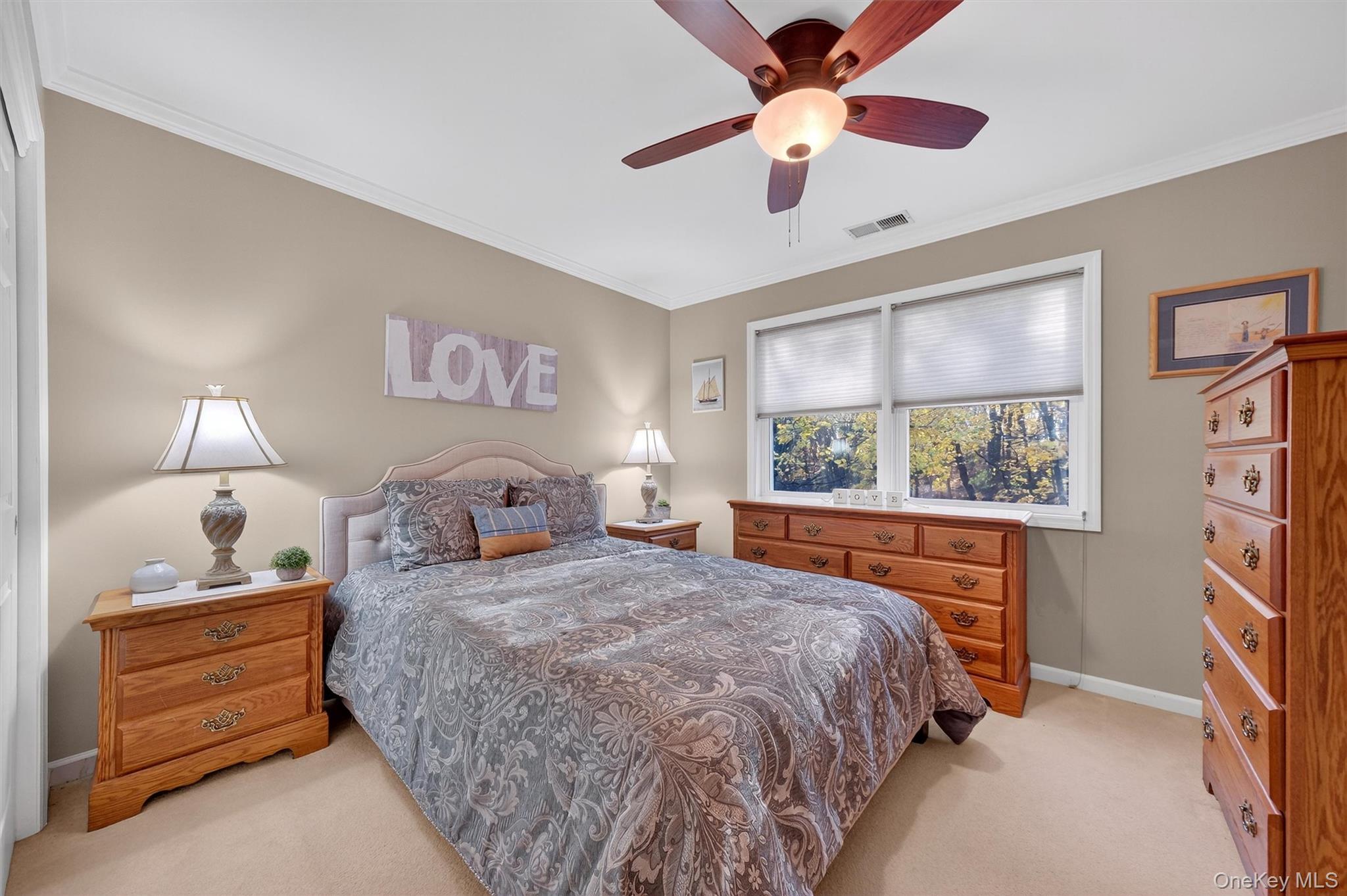 2 Deer Crossing Drive Fishkill, NY 12524 - Photo 27 of 49 a bedroom with a bed and a large window