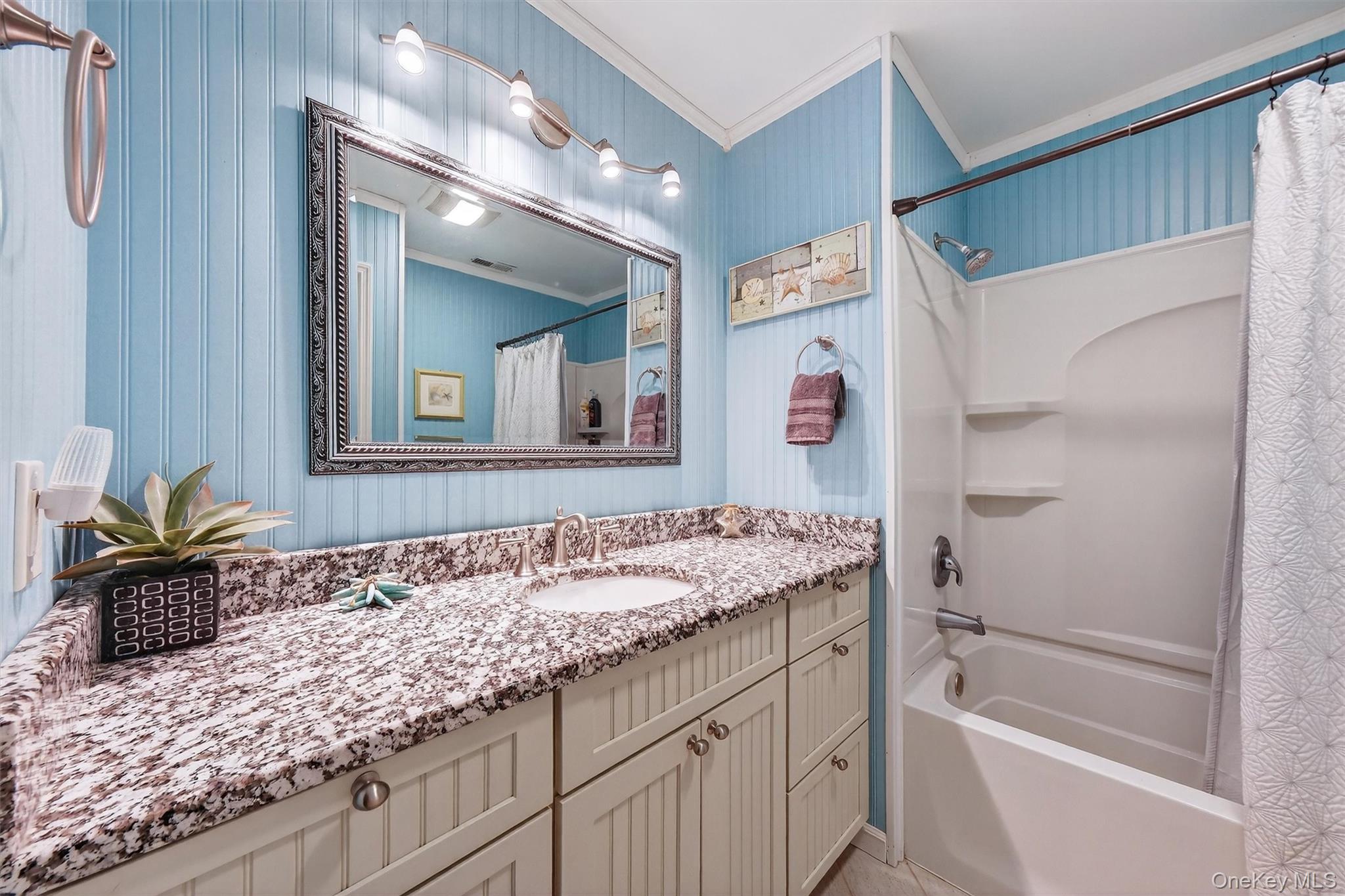 2 Deer Crossing Drive Fishkill, NY 12524 - Photo 29 of 49 a bathroom with a granite countertop sink and a mirror