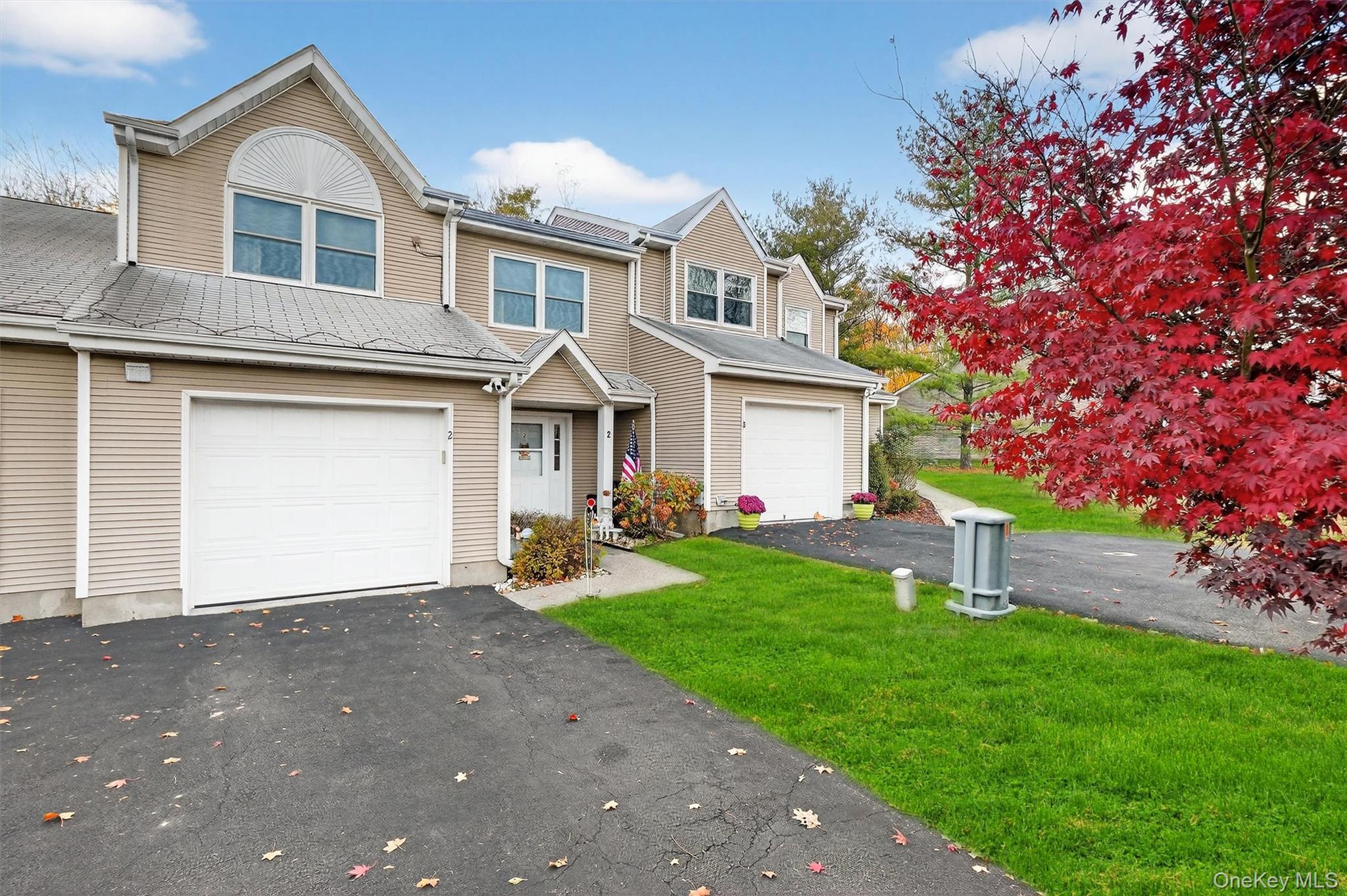 2 Deer Crossing Drive Fishkill, NY 12524 - Photo 5 of 49 a front view of a house with garden and porch