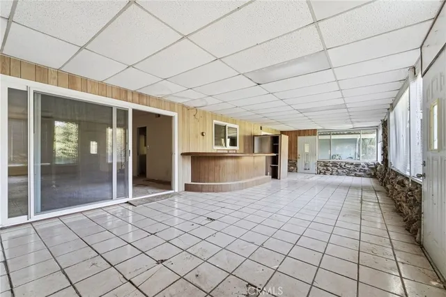 a view of an empty room and window