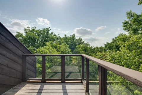 a balcony with an outdoor space