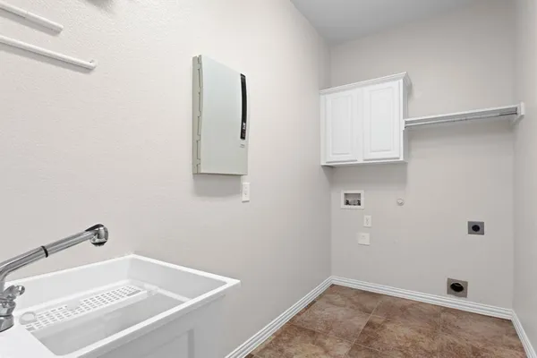 a bathroom with a tub and sink