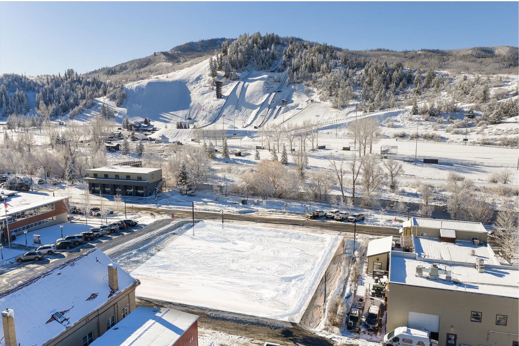 1010 Yampa Street, Unit R3 Steamboat Springs, CO 80487 - Photo 3 of 7 a view of a backyard with sitting area