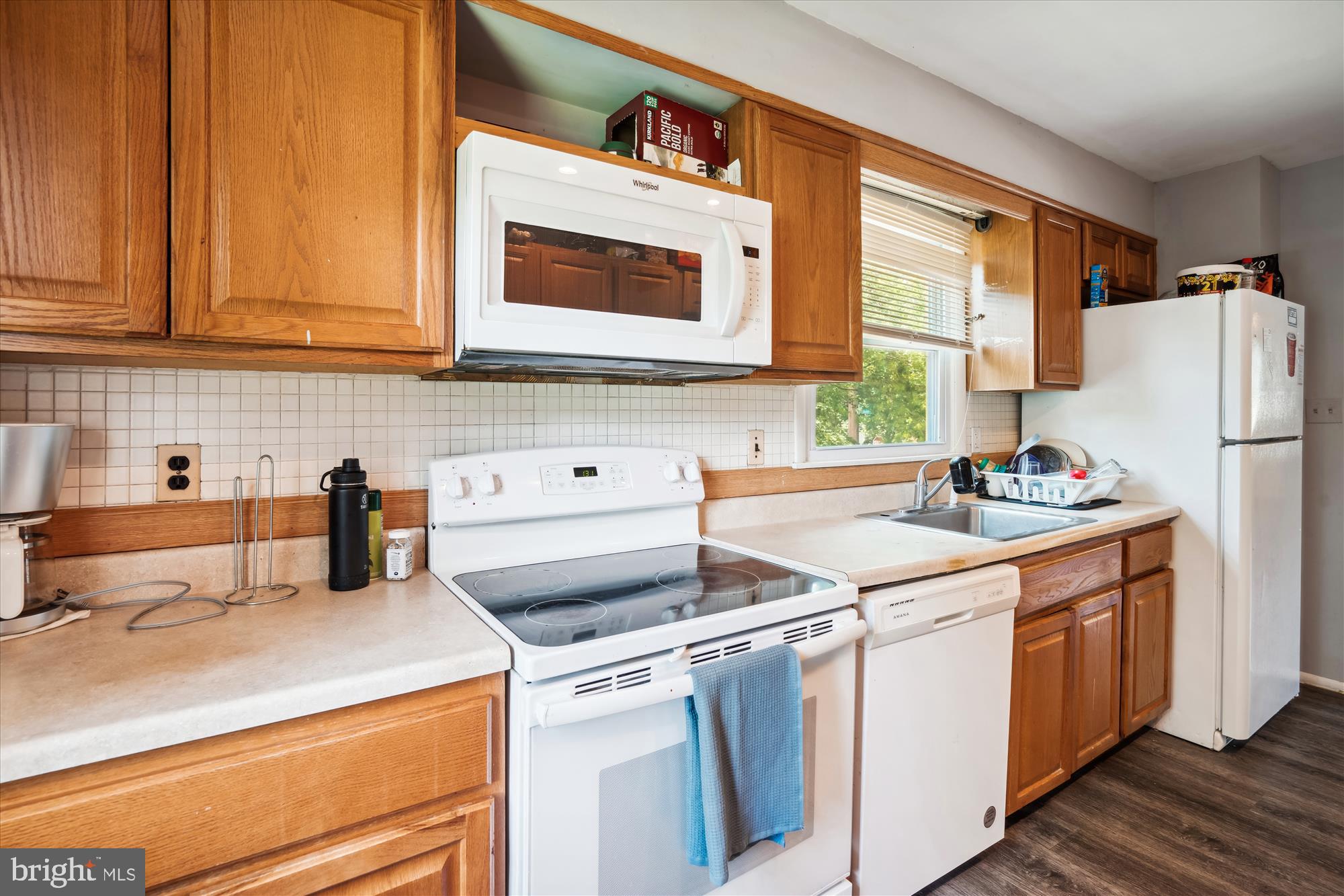 4701 Norwich Road College Park, MD 20740 - Photo 3 of 16 a kitchen with a sink cabinets and appliances