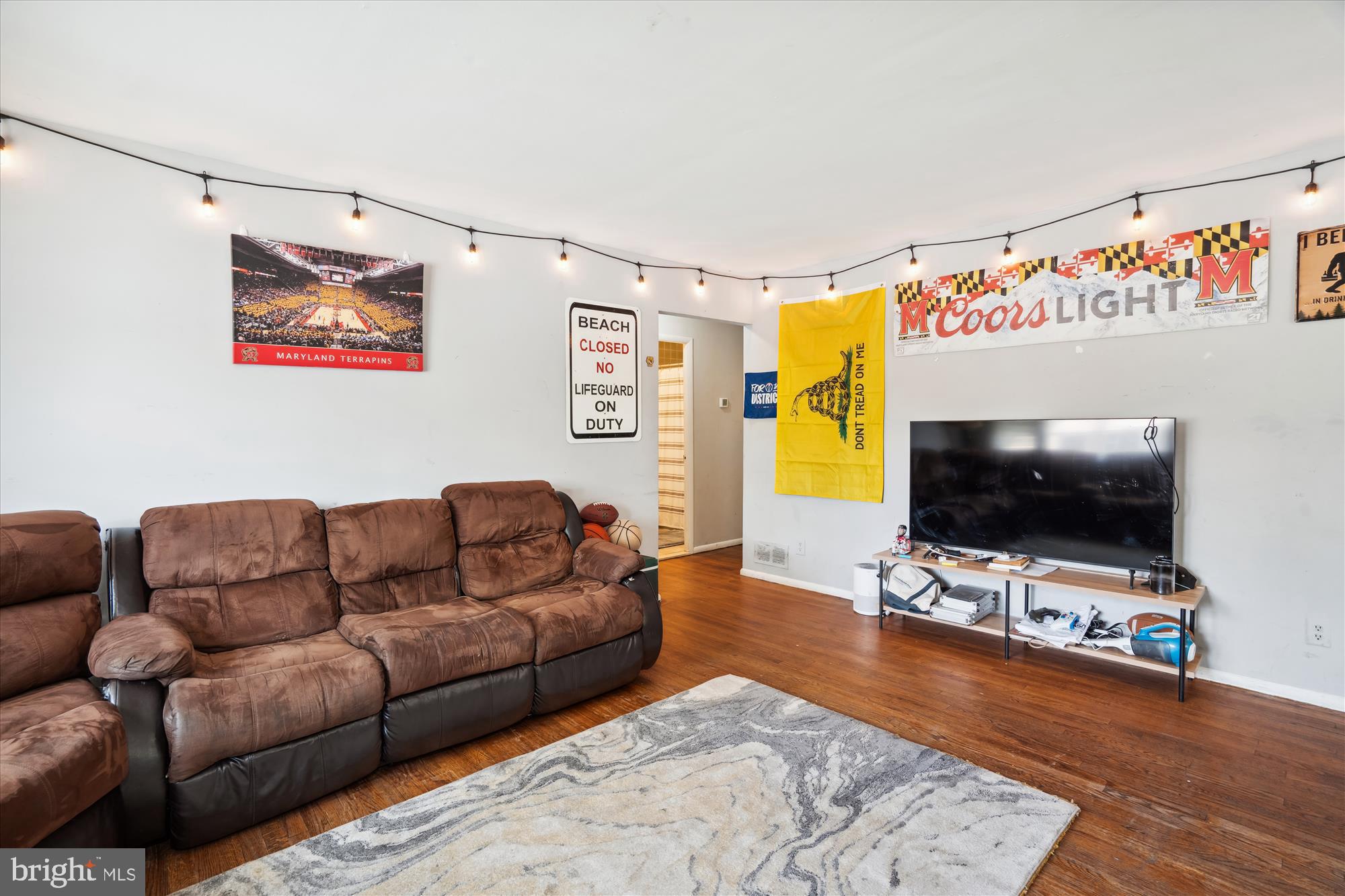 4701 Norwich Road College Park, MD 20740 - Photo 5 of 16 a living room with furniture and a flat screen tv