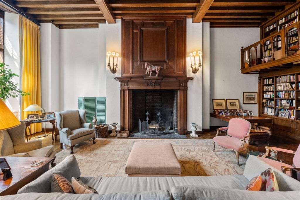 32 Lime Street Boston, MA 02108 - Photo 11 of 30 a living room with furniture and a fireplace