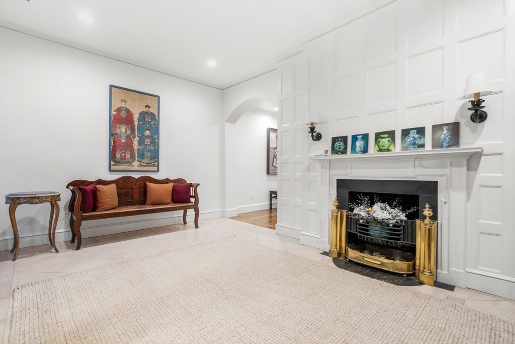 32 Lime Street Boston, MA 02108 - Photo 3 of 30 a living room with furniture and a fireplace