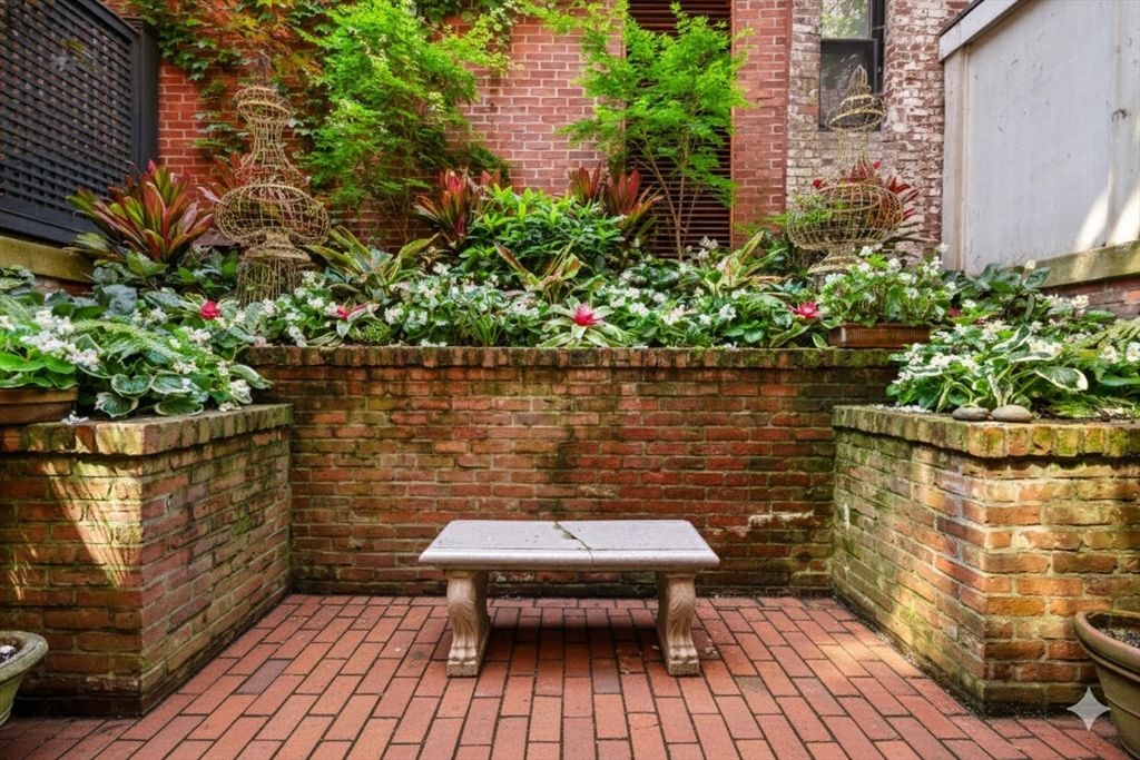 32 Lime Street Boston, MA 02108 - Photo 9 of 30 a view of a terrace with sitting area