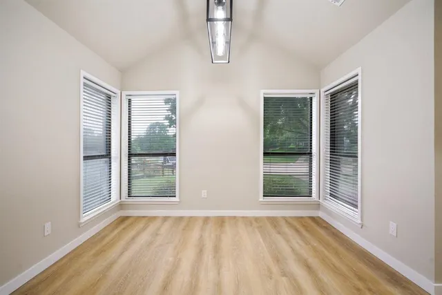 a view of a kitchen with a sink cabinets and a window