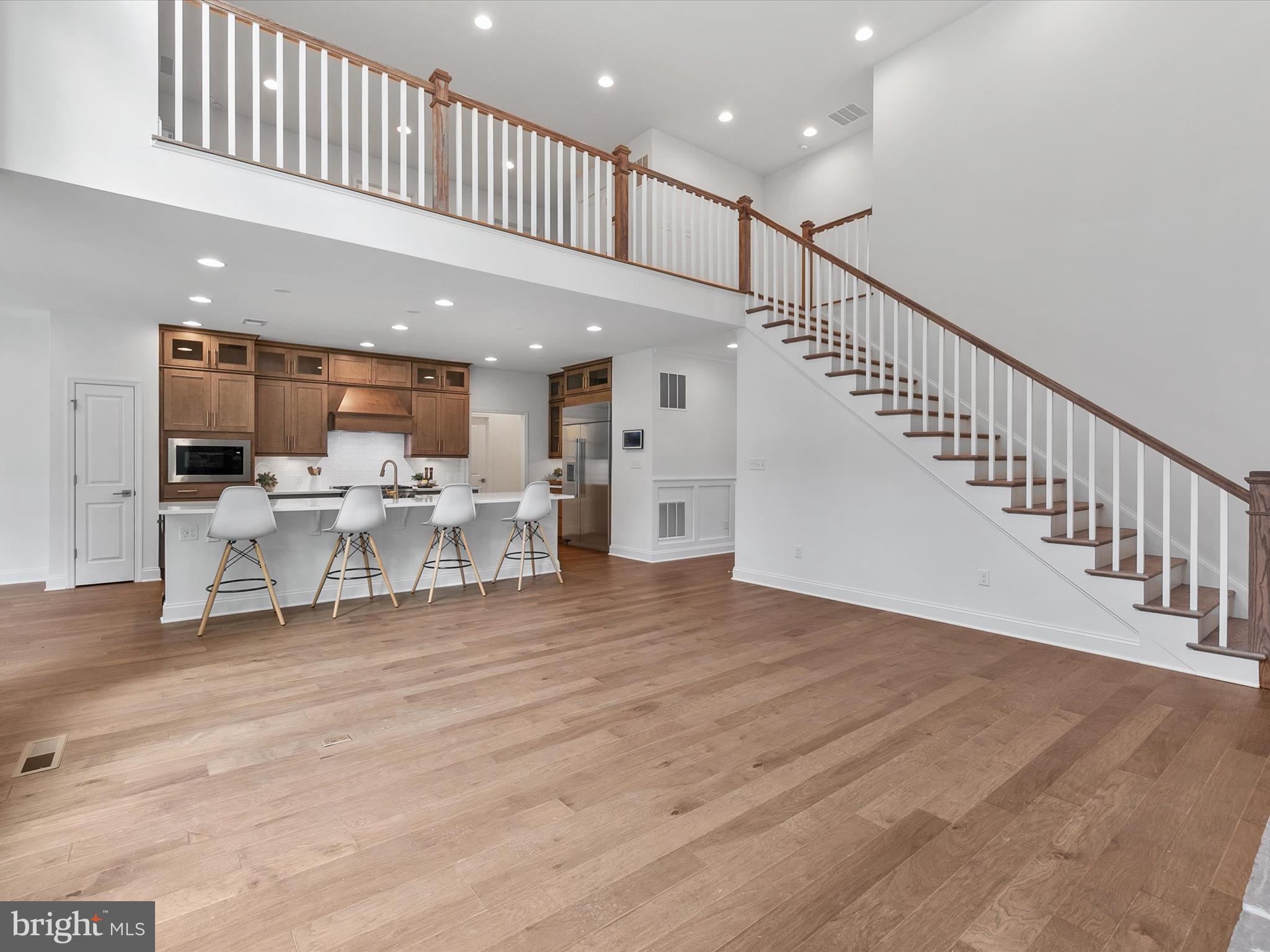 21650 Eastbridge Loop Lewes, DE 19958 - Photo 106 of 106 a view of kitchen with furniture and a living room