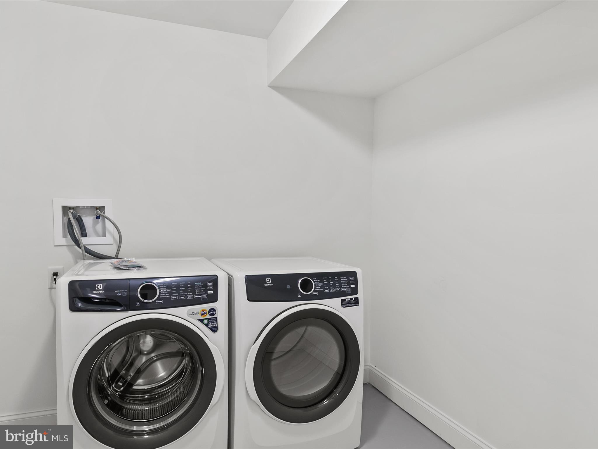 21650 Eastbridge Loop Lewes, DE 19958 - Photo 46 of 106 Basement Laundry Room