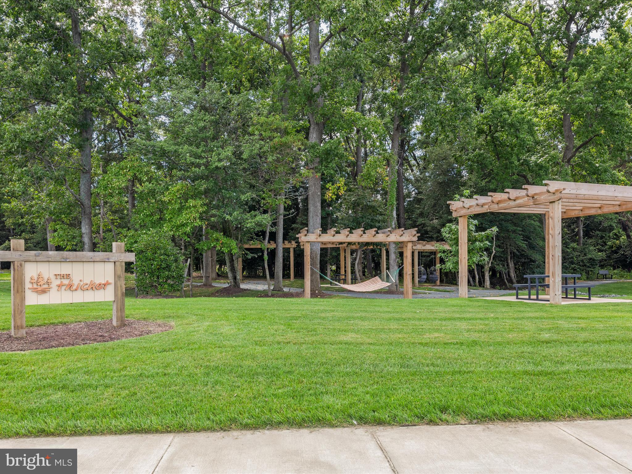 21650 Eastbridge Loop Lewes, DE 19958 - Photo 78 of 106 a view of a house with a yard