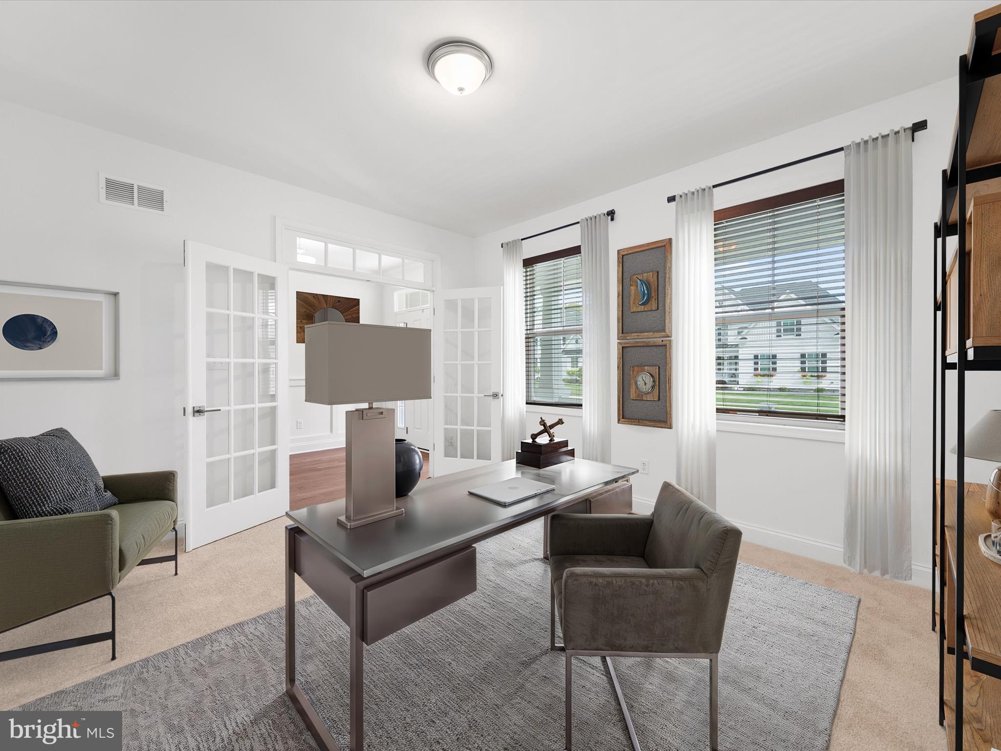 21650 Eastbridge Loop Lewes, DE 19958 - Photo 8 of 106 a living room with furniture and a window
