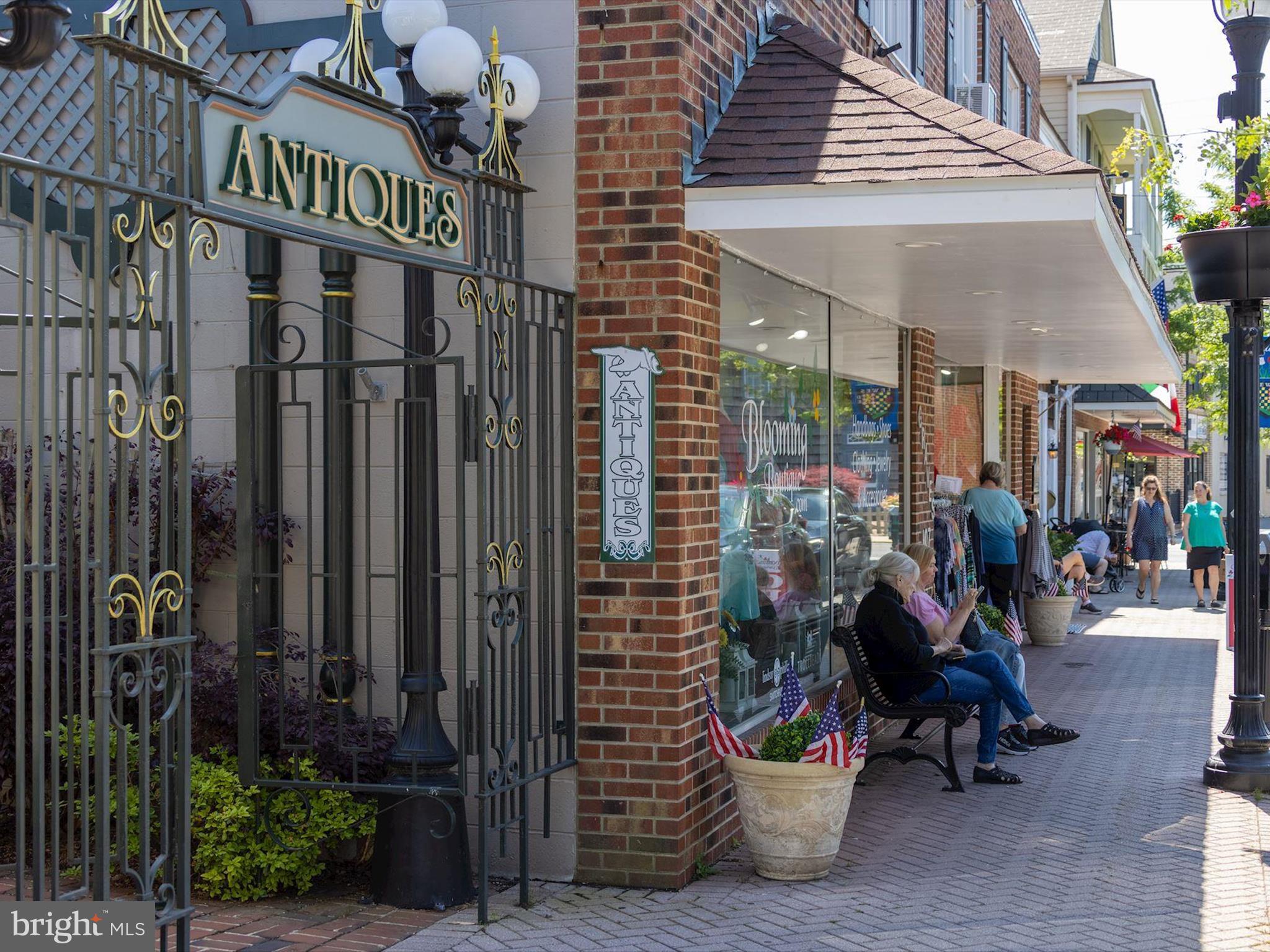 21650 Eastbridge Loop Lewes, DE 19958 - Photo 97 of 106 a view of a street with sitting area