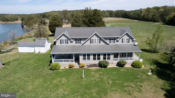 a view of a house with a big yard