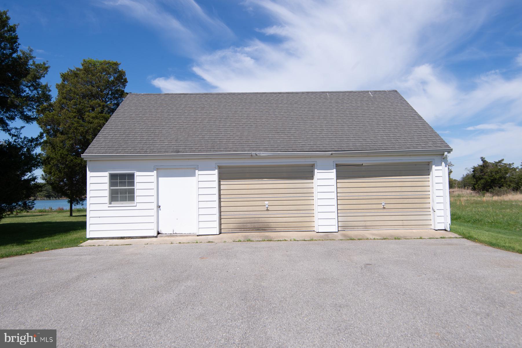 5704 Ross Neck Road Cambridge, MD 21613 - Photo 26 of 98 Charming garage with scenic backdrop.