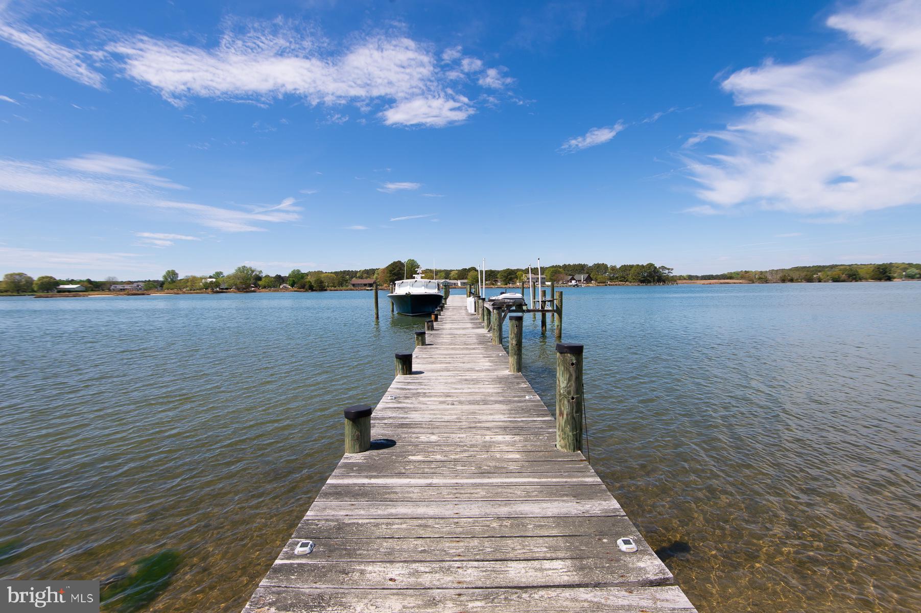 5704 Ross Neck Road Cambridge, MD 21613 - Photo 37 of 98 Tranquil dock by serene waters.