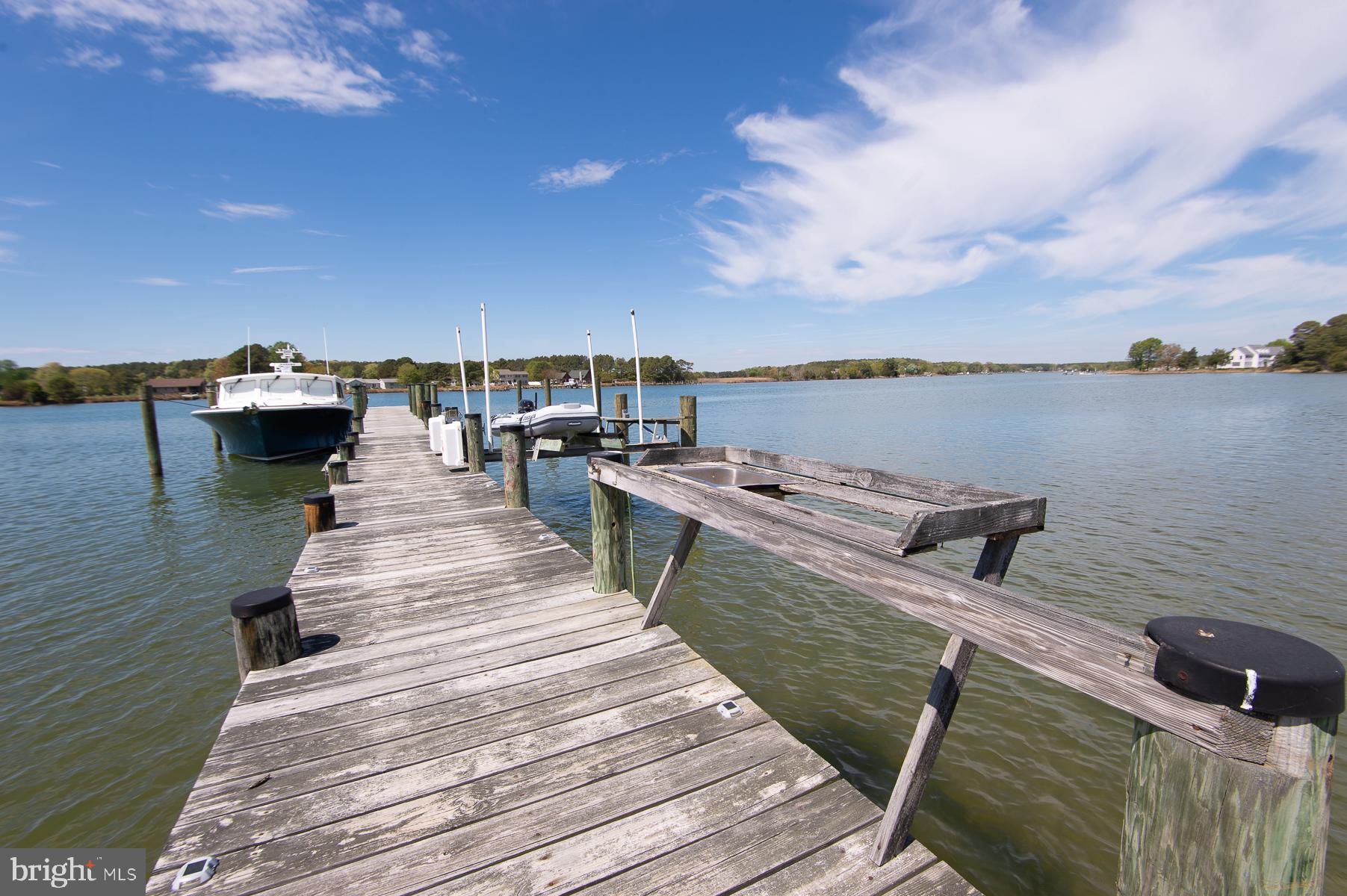 5704 Ross Neck Road Cambridge, MD 21613 - Photo 38 of 98 Serene dock by tranquil waters.