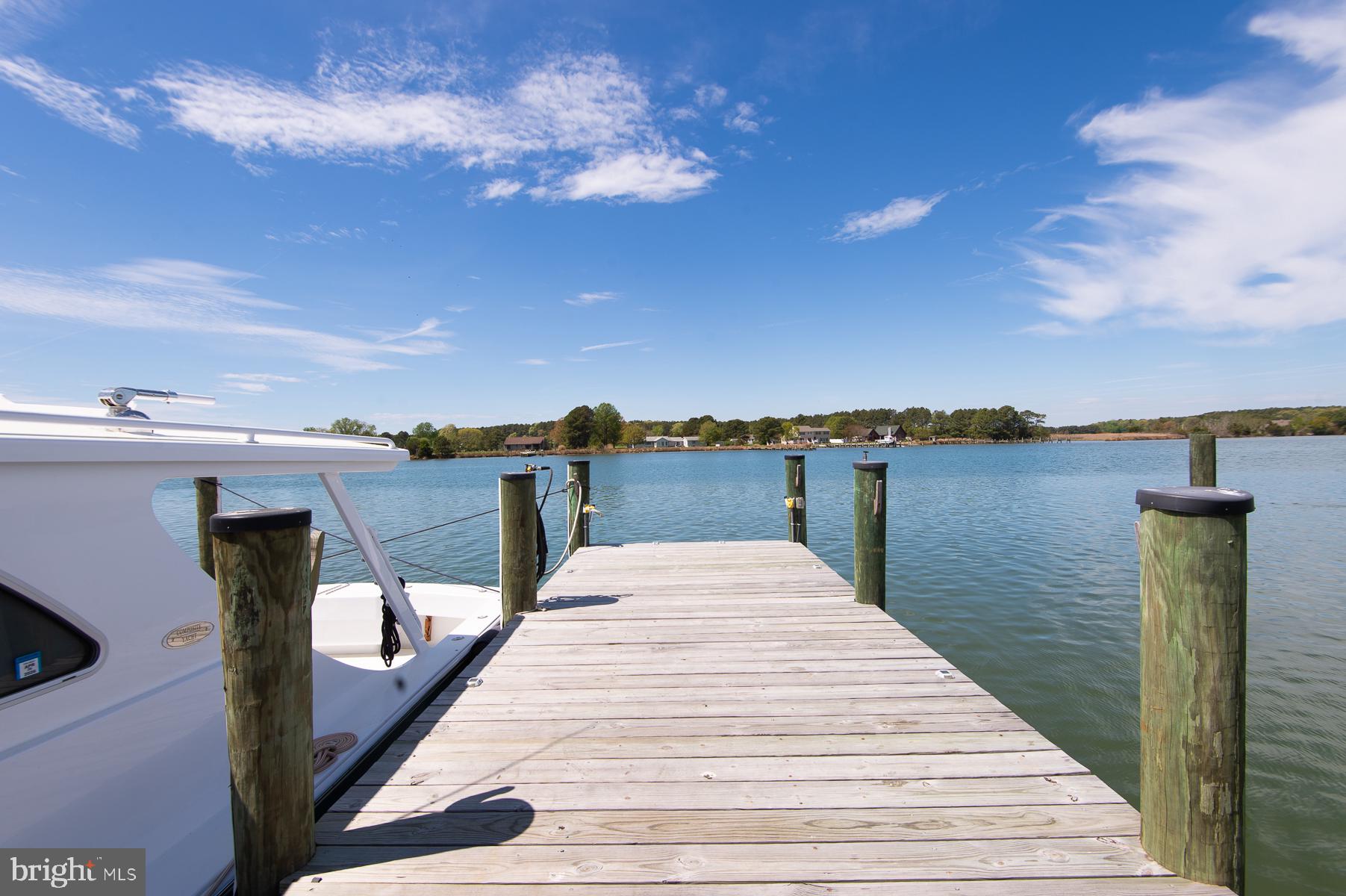 5704 Ross Neck Road Cambridge, MD 21613 - Photo 41 of 98 Tranquil dock by serene waters.