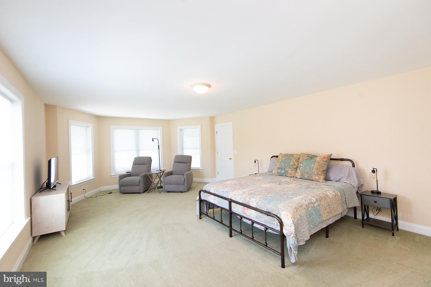 5704 Ross Neck Road Cambridge, MD 21613 - Photo 65 of 98 Spacious, sunlit bedroom retreat.