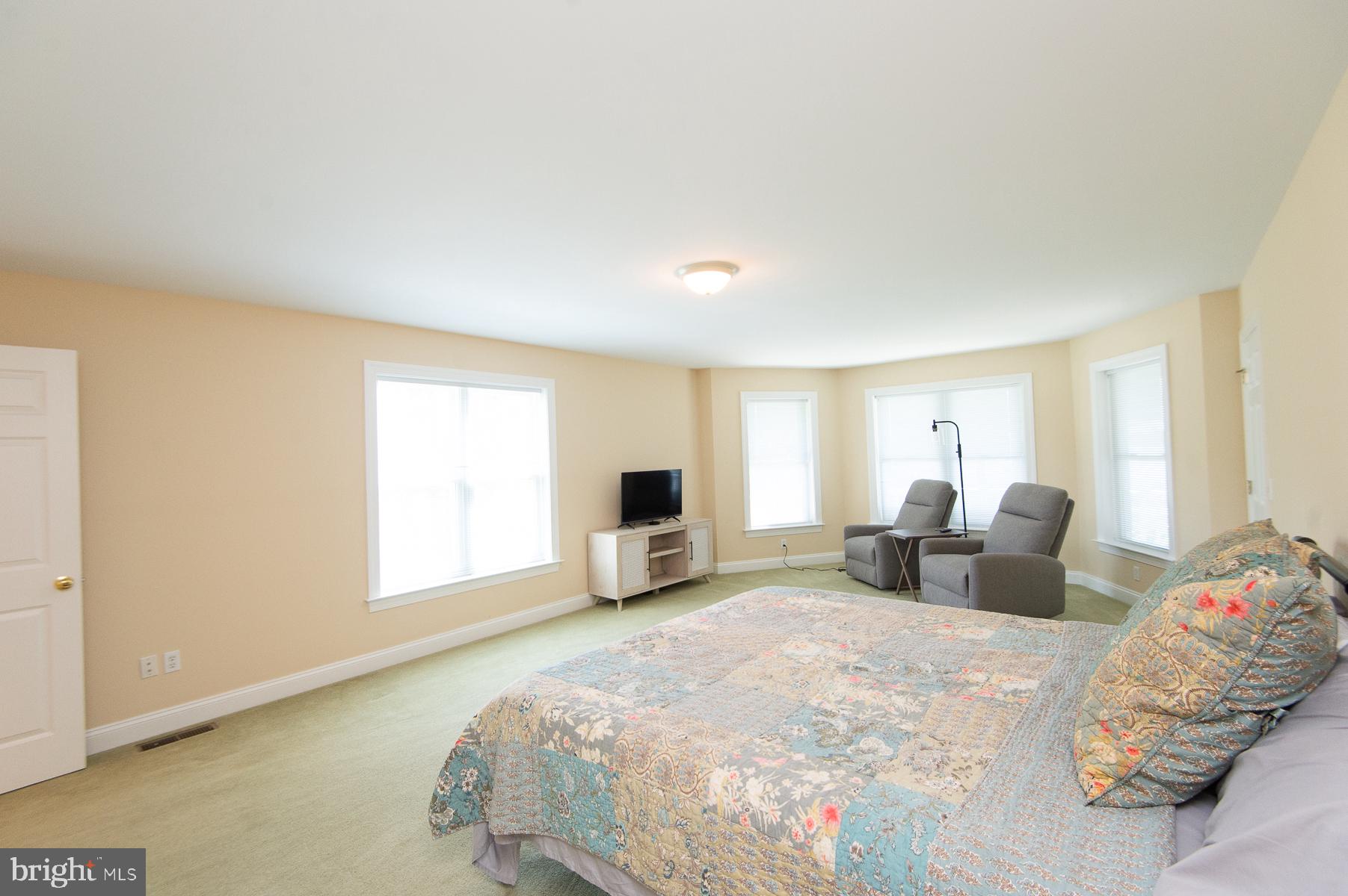 5704 Ross Neck Road Cambridge, MD 21613 - Photo 66 of 98 Spacious, sunlit bedroom retreat.