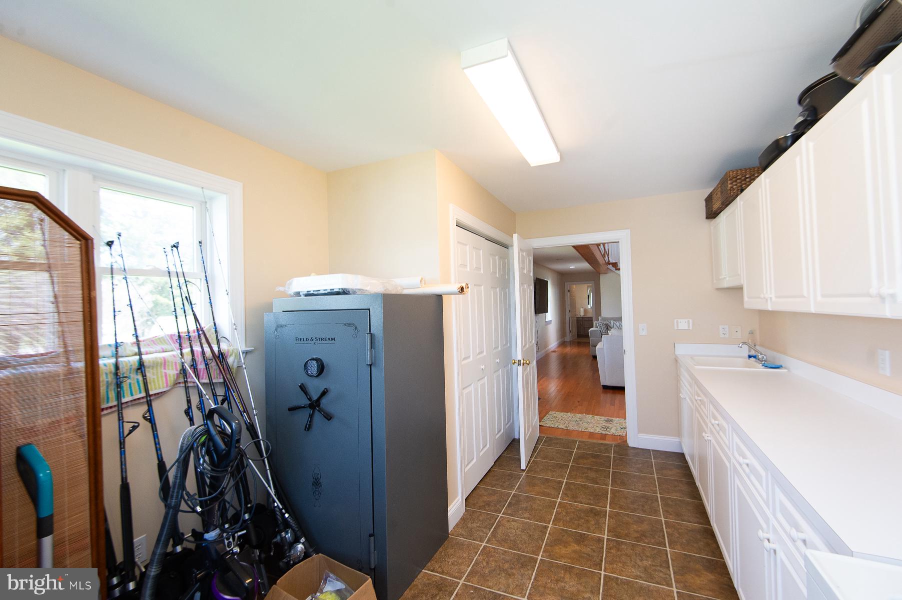 5704 Ross Neck Road Cambridge, MD 21613 - Photo 69 of 98 Bright and functional laundry space.