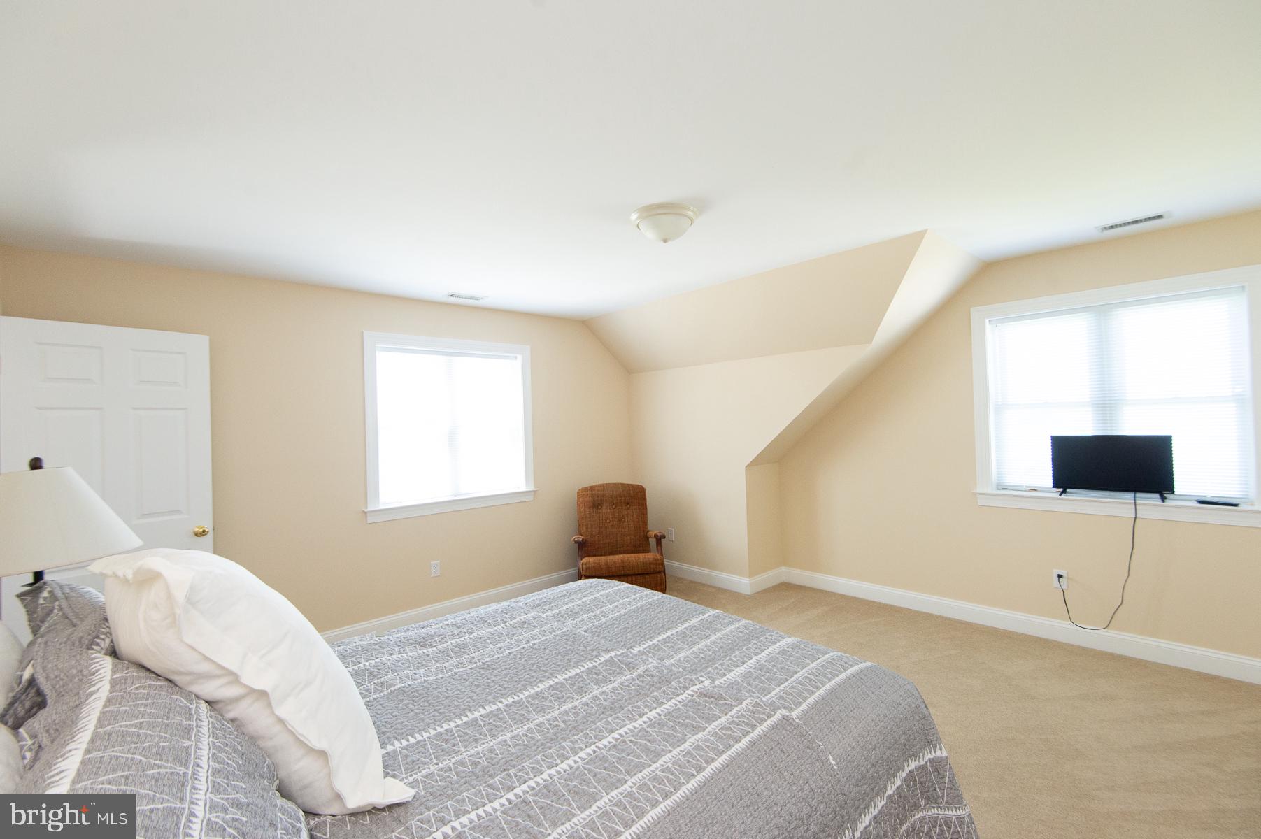 5704 Ross Neck Road Cambridge, MD 21613 - Photo 84 of 98 Spacious, light-filled bedroom retreat.