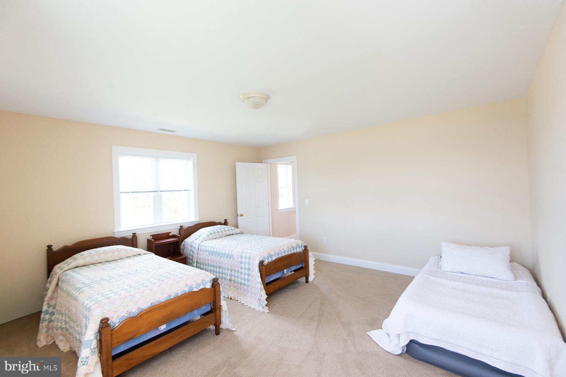 5704 Ross Neck Road Cambridge, MD 21613 - Photo 87 of 98 Bright and airy bedroom retreat.