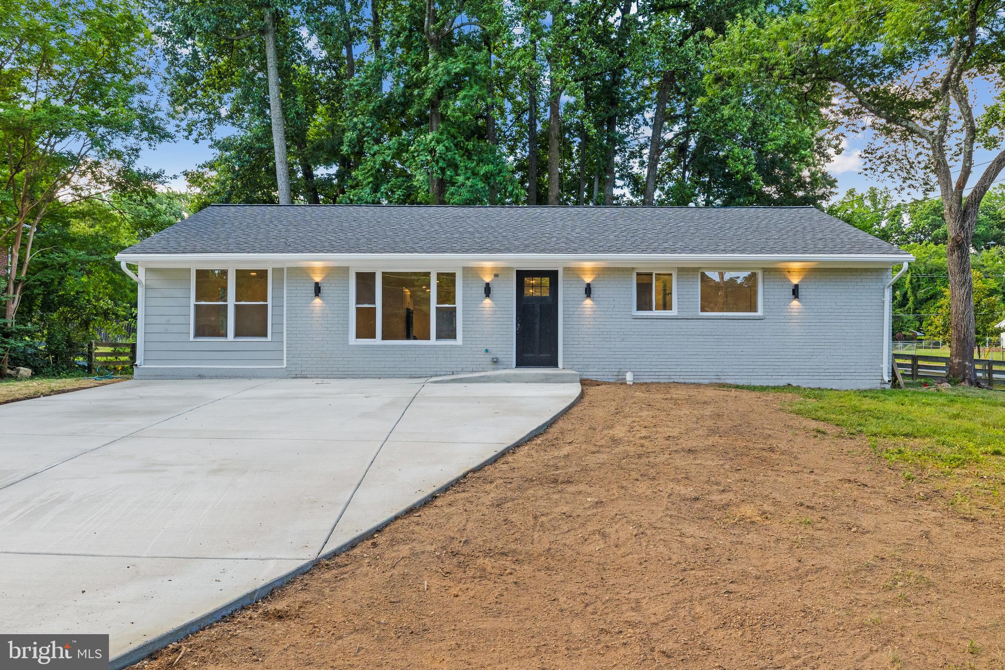 7129 Catlett Street Springfield, VA 22151 - Photo 1 of 34 front view of house with a yard