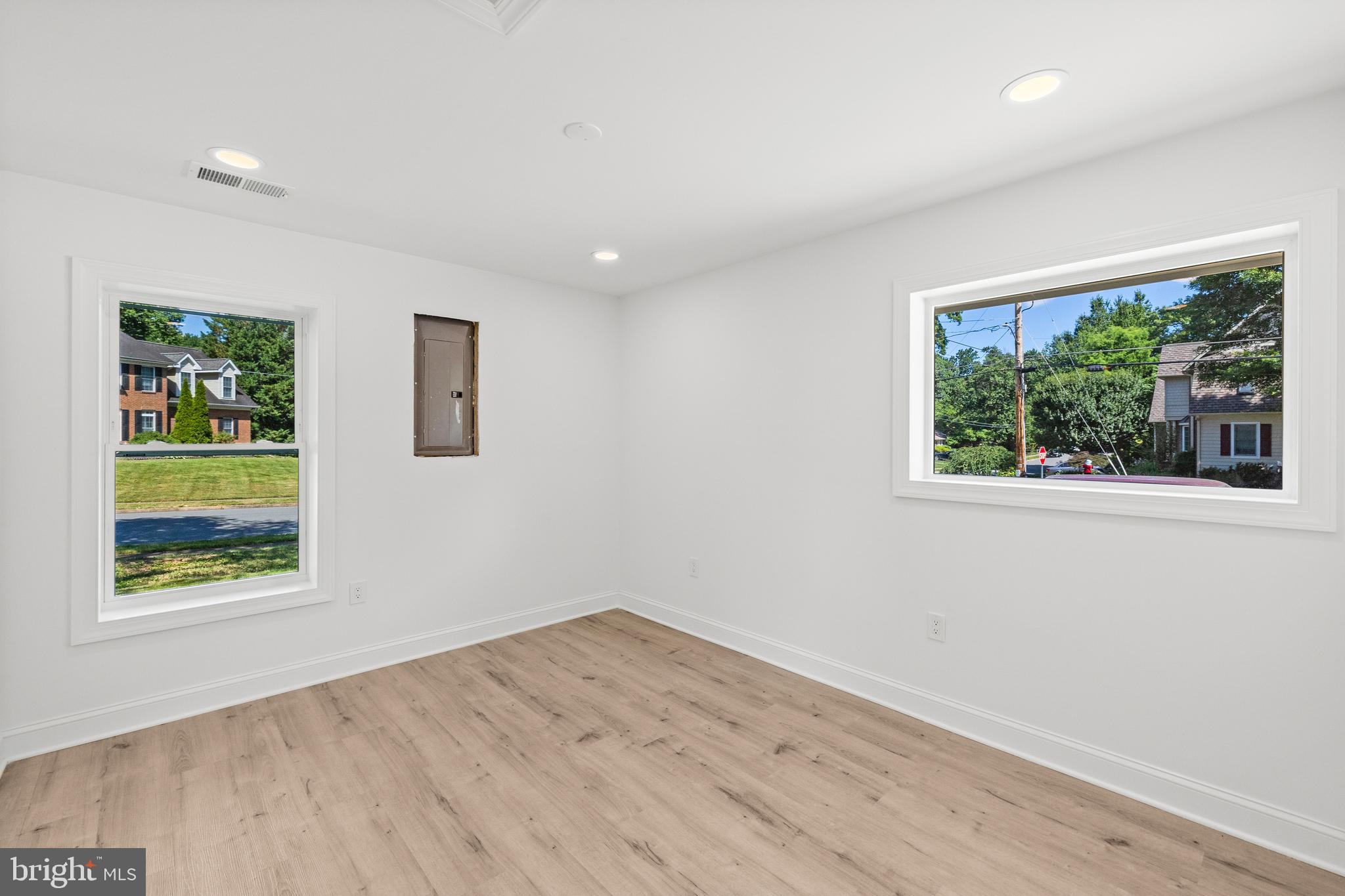 7129 Catlett Street Springfield, VA 22151 - Photo 22 of 34 wooden floor in an empty room with a window